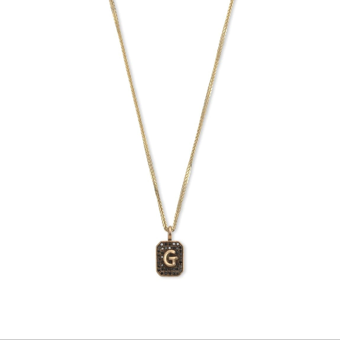 14k gold necklace with initials letter pendant with black diamonds, design by Maya Geller