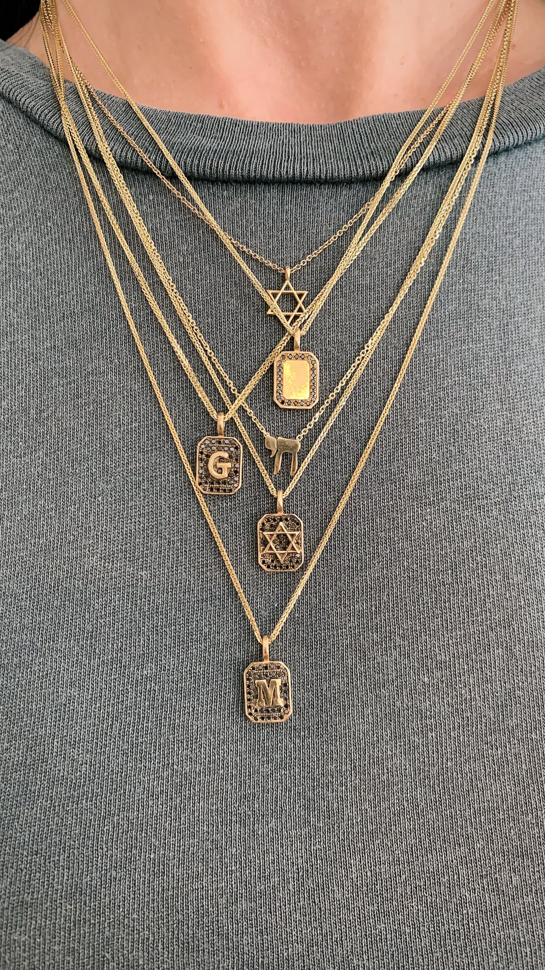 מיה גלר שרשראות זהב. Maya Geller gold necklaces. שרשראות זהב. Magen David.