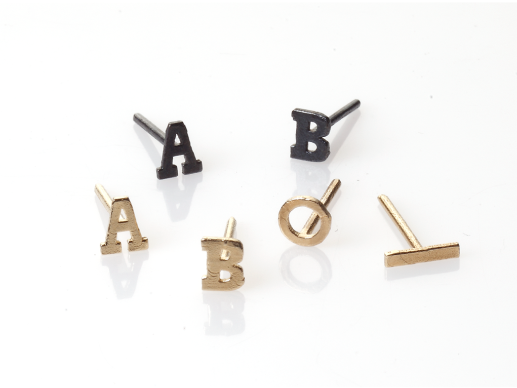 silver and gold earrings_letters_maya geller