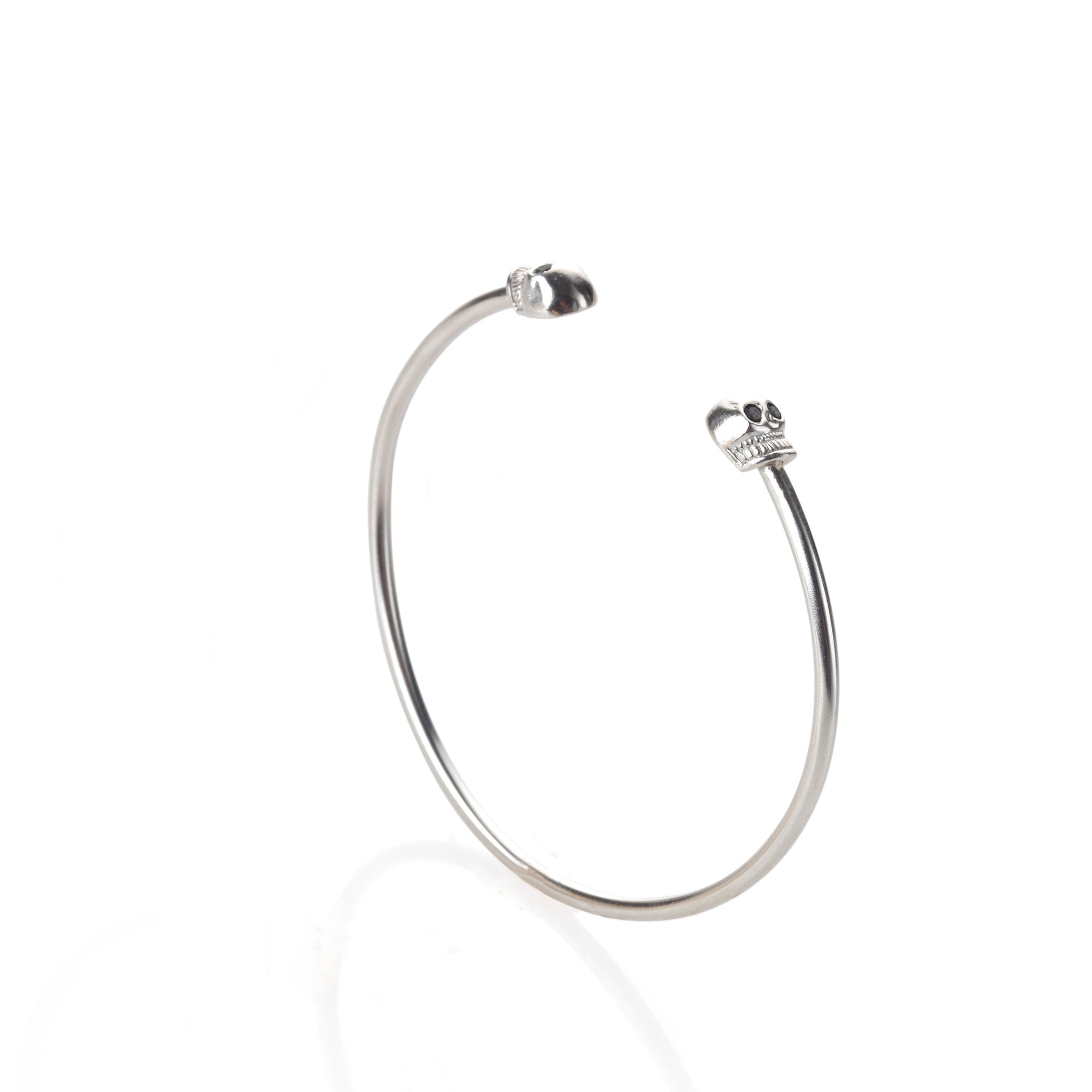 Silver open bracelet - baby skulls