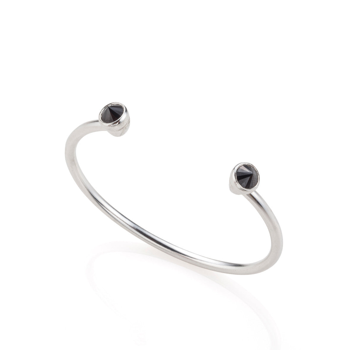 Open silver bracelet with black stones