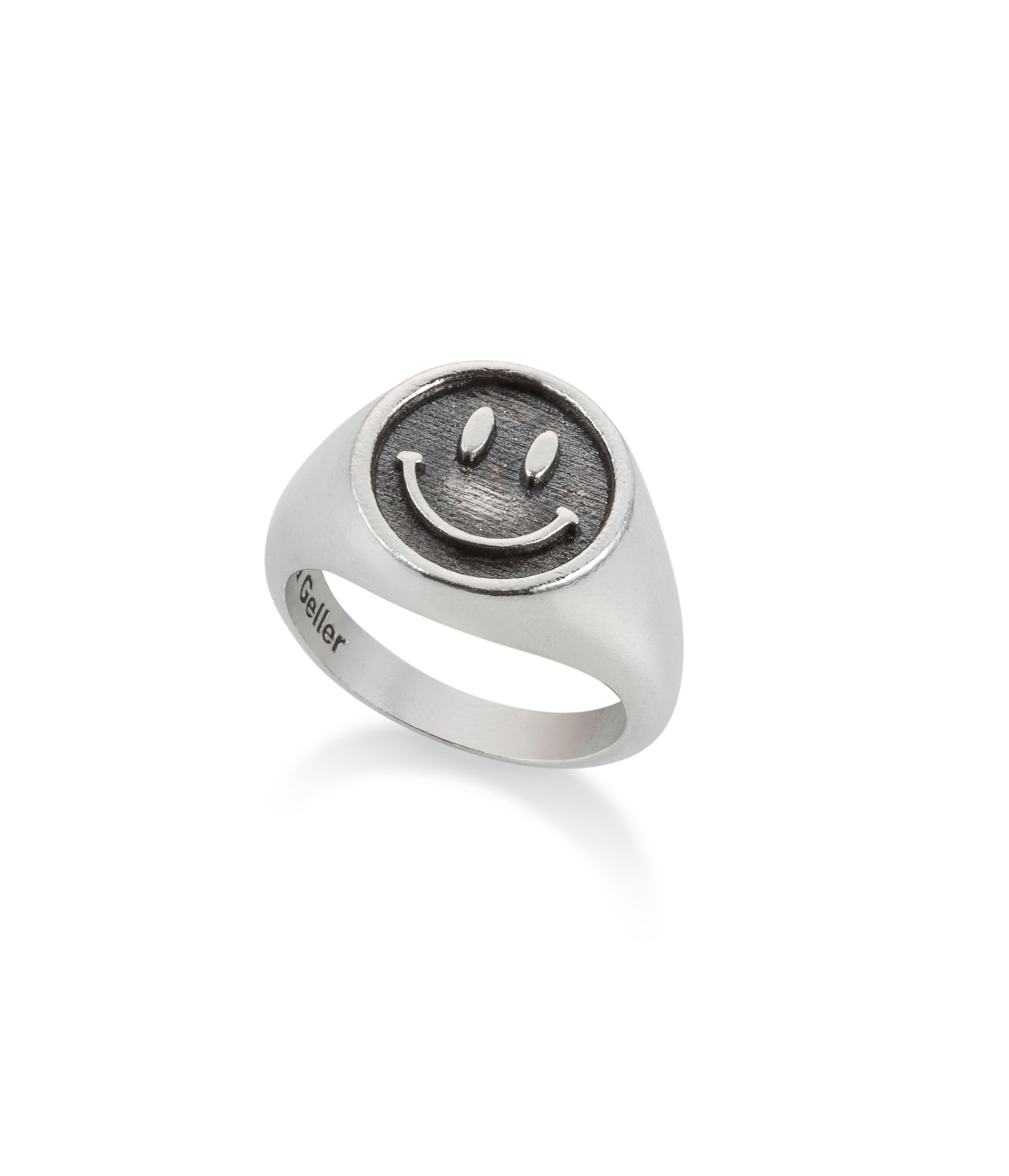 silver smiley ring. silver smiley pinkey ring. Maya Geller.