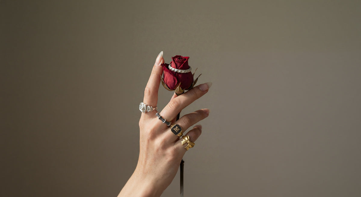 hand with maya geller rings mix