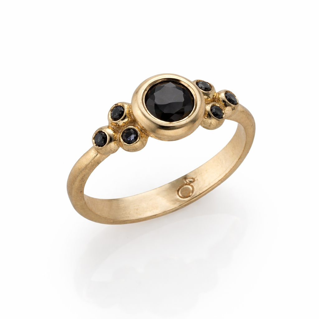 Gold ring with black diamonds