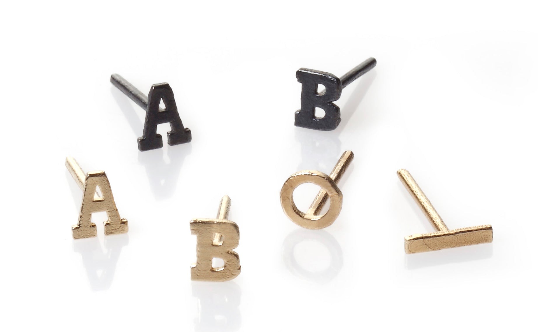 Letters Stud earrings mix by maya geller