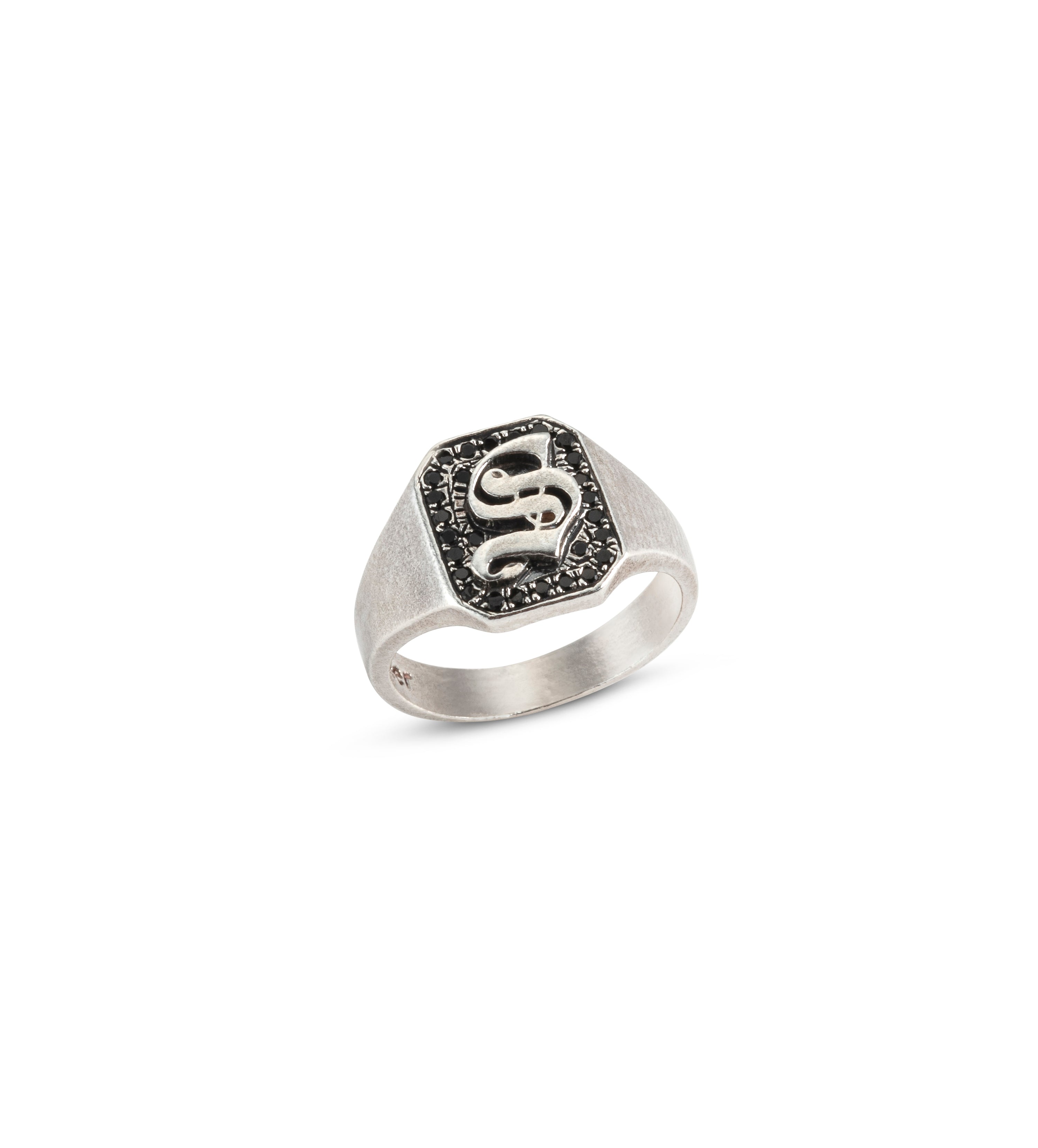 Silver ring with a black stones and gothic letter design by Maya Geller 