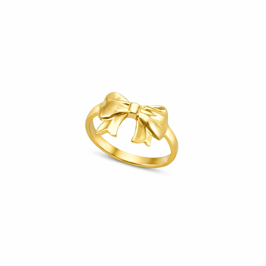 Gold bow-shaped ring by maya geller