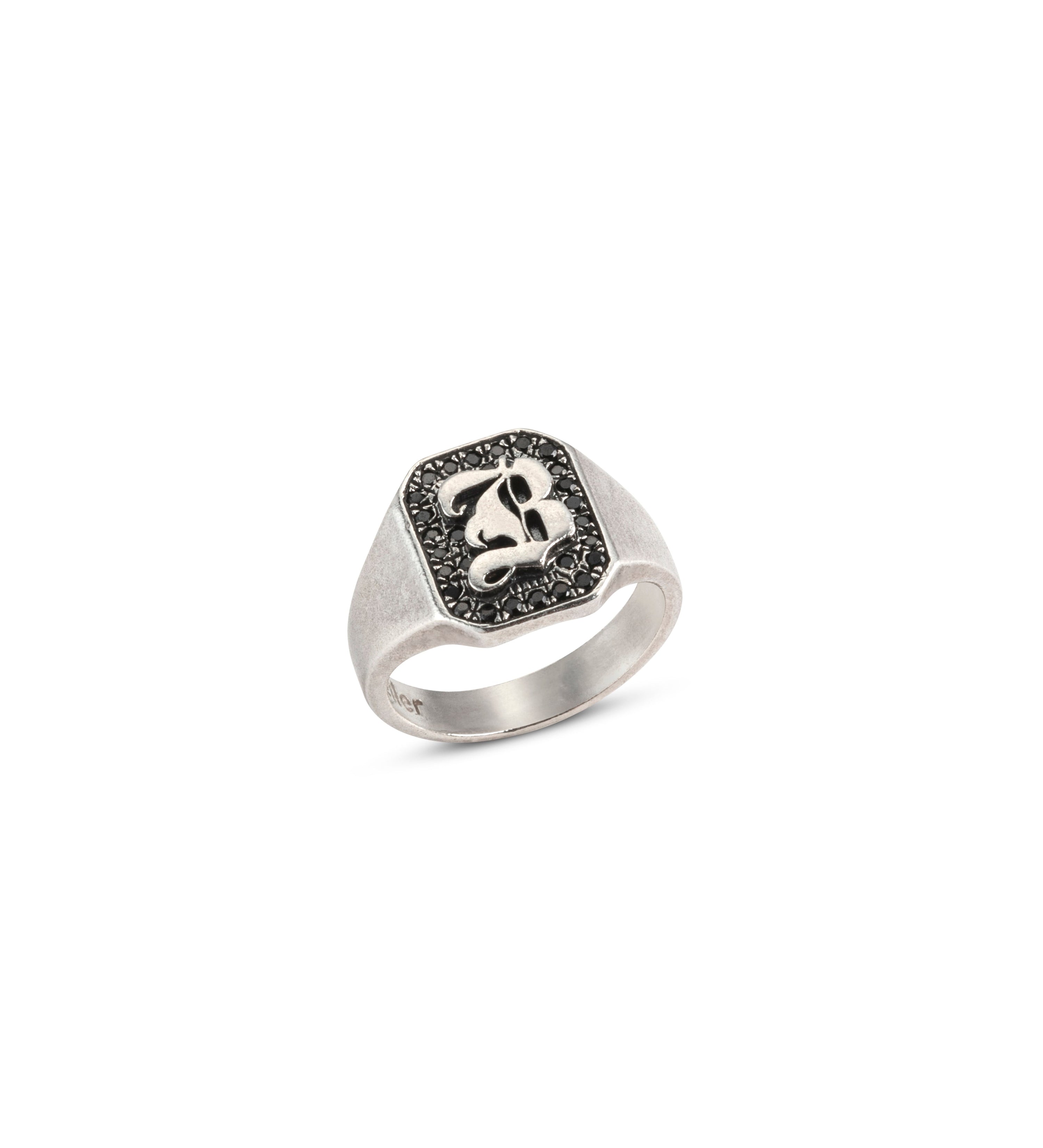 Silver ring with a black stones and gothic letter by Maya Geller