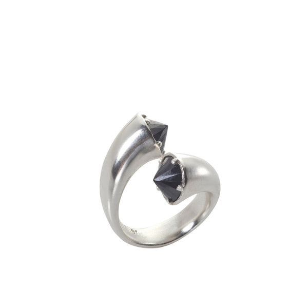 open silver ring with black stones.