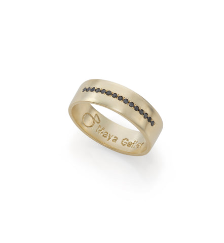 14k gold ring with a line of black diamonds