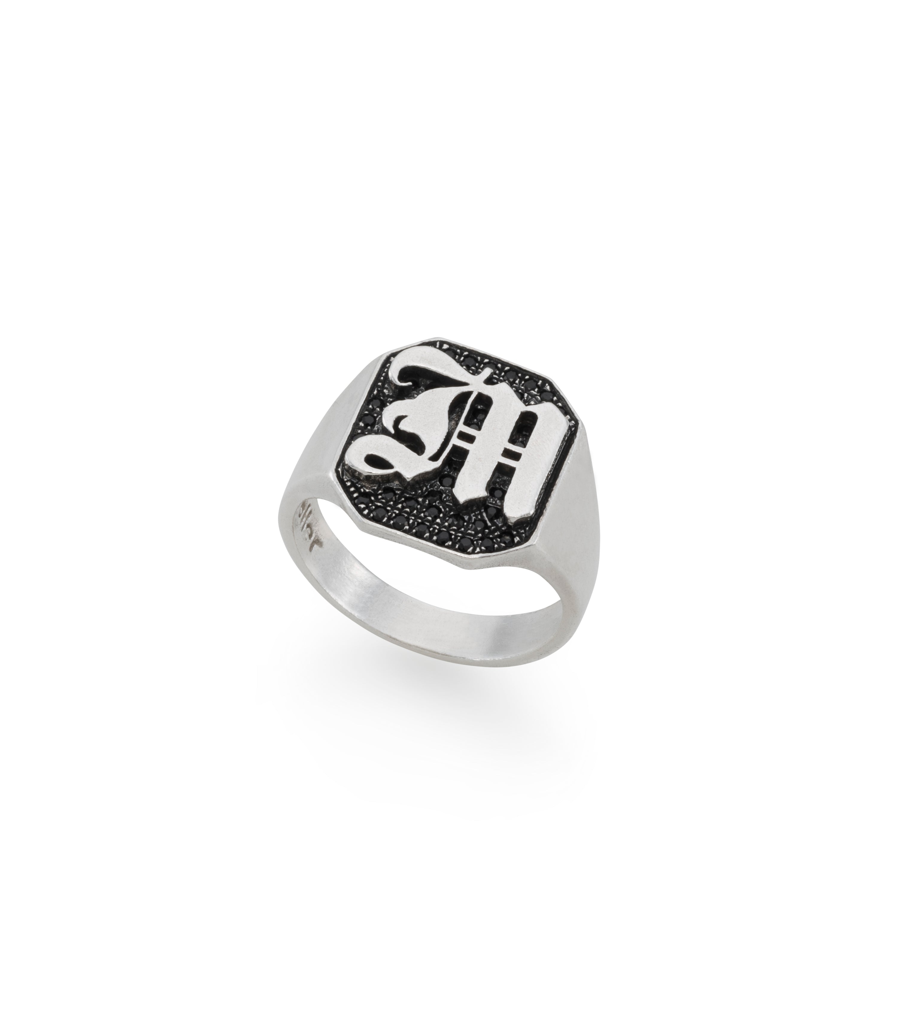 silver signet ring with gothic letter and black stones