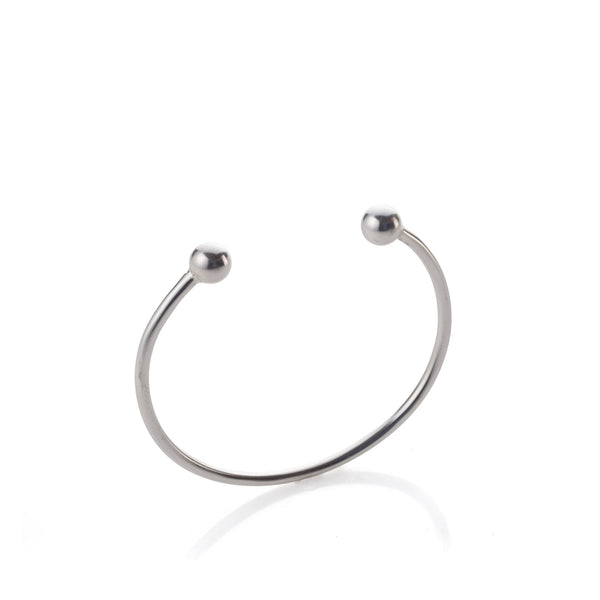 Open silver bracelet with small balls