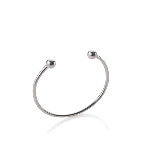 Open silver bracelet with small balls