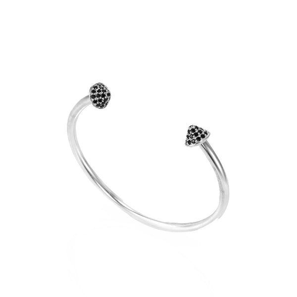 Open silver bracelet with small black stones