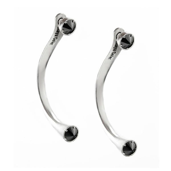 Long silver "pierce" earring with black stones