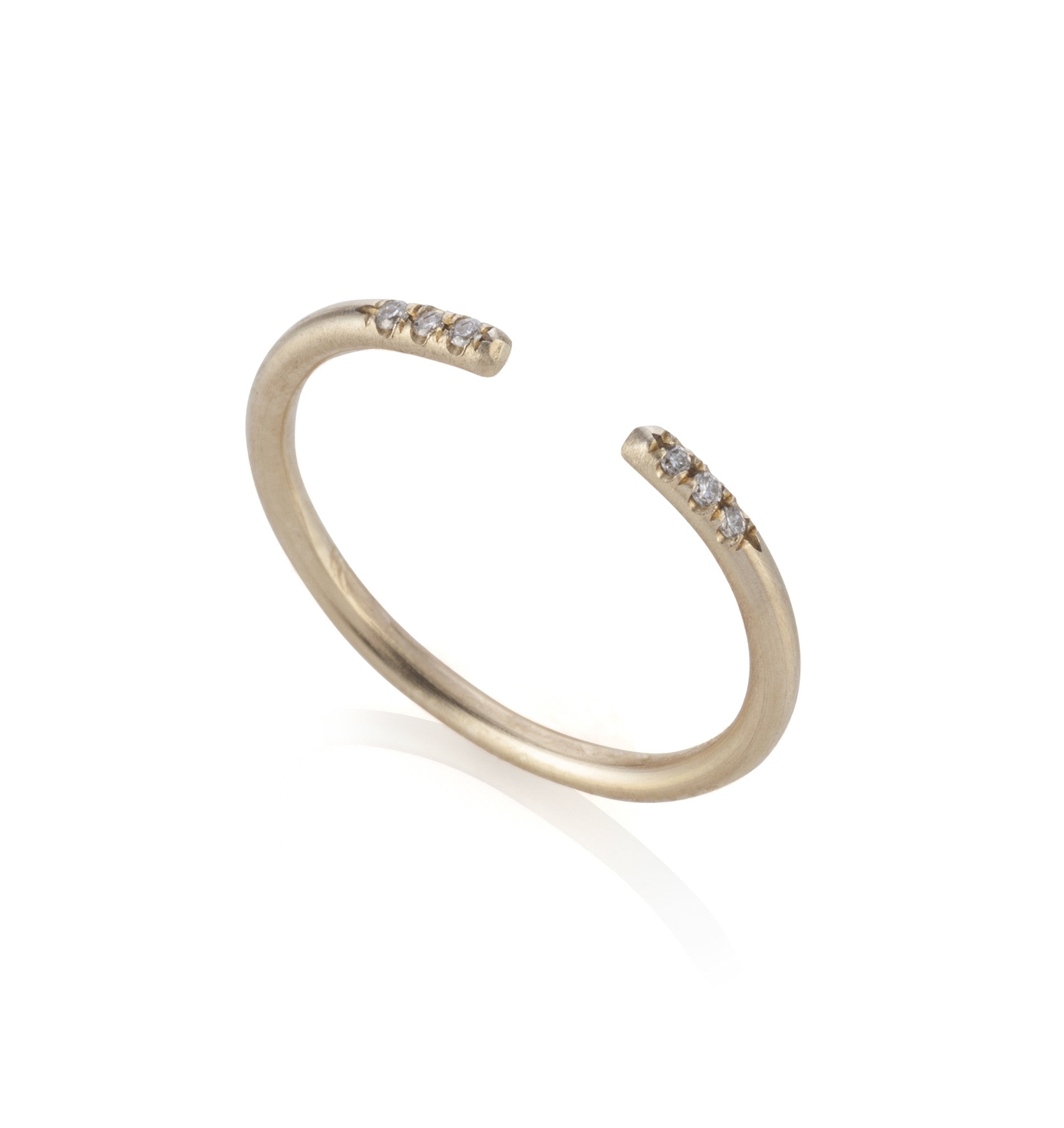 open gold ring with 6 diamonds