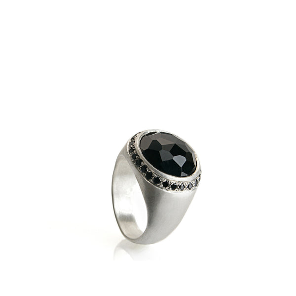 Silver signet ring with onyx and small black stones